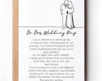 May include: A white greeting card with a brown envelope featuring a black line drawing of a couple standing together. The text reads: On Our Wedding Day, followed by a heartfelt message about love, gratitude, and starting a life together as partners.