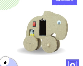 May include: A wooden elephant robot kit with a red switch, a battery compartment, and a black eye. The kit is labeled "Elephant Robot".