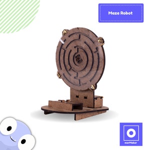May include: A wooden maze robot toy with a brown base and a circular maze on top. The maze has a brown wooden frame and a white center. The robot is on a white background.