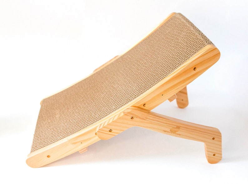 Wooden cat scratcher at a 45 degree angle on a white background