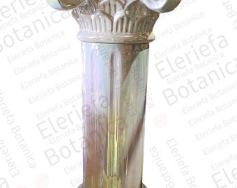 May include: A white ceramic pedestal with a decorative top and a iridescent finish. The pedestal has a square base and a round top.