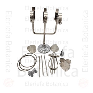 May include: A set of silver-toned metal tools for plant propagation, including a tripod stand with three rings, a wire coil, a small metal dog figurine, and several metal tools with pointed ends.