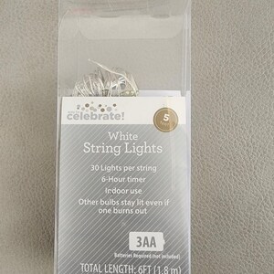 May include: White string lights with 30 lights per string, a 6-hour timer, and indoor use. The lights are 5 feet long and require 3 AA batteries (not included). Total length is 6 feet (1.8 metres) and lighted length is 5 feet (1.5 metres).