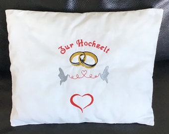 Cushion embroidered with wedding motif