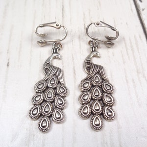 Elegant Silver-tone Clip On Peacock Earrings image 1