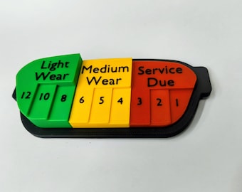 Display con guida visiva per l'usura delle pastiglie dei freni per autoveicoli