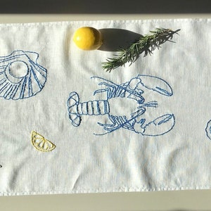 Hand-Embroidered Linen Table Runner: Mediterranean Seafood Design, lobster, shrimps, scallop, oysters, fish, lemon, rosemary