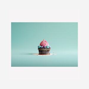 May include: A pink and blue cupcake with sprinkles on a light blue background.