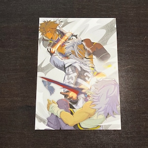May include: A white, gray, and black illustration of three characters from a video game. The characters are in a fighting pose with their arms raised. The background is a light gray with a white and gray pattern.
