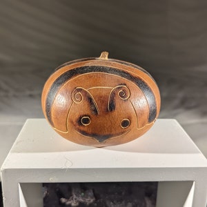 Small Peruvian Gourd art. Small bee carving on gourd from Peru. Vintage South American indigenous style carved artwork. Signed original art.