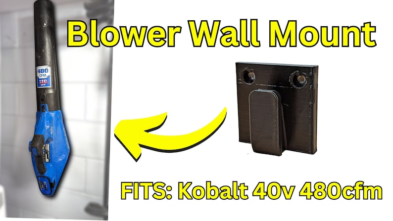 K&ouml;nnte beinhalten: Eine schwarze Wandhalterung aus Kunststoff f&uuml;r einen Laubbl&auml;ser. Die Halterung hat zwei Schraubenl&ouml;cher und einen Haken, um den Laubbl&auml;ser zu halten. Der Text "FITS: Kobalt 40V 480cfm" ist unter der Halterung aufgedruckt.