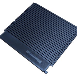 May include: A dark blue, rectangular, ridged object with a handle-like extension. The object has a series of parallel lines across its surface. The handle-like extension has a design etched into it.