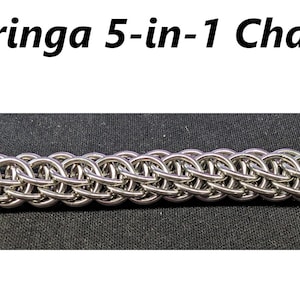 May include: A silver Syringa 5-in-1 chain, a type of chainmail, is shown on a black background.