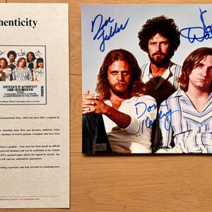THE EAGLES Signed Photo COA Hologram main image 0