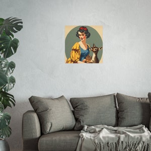 vintage style Snow White art hanging above a sofa