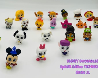 May include: A collection of 20 Disney Doorables figurines in a variety of colors and characters. The figurines are part of the Special Edition Technicolor Series 11.
