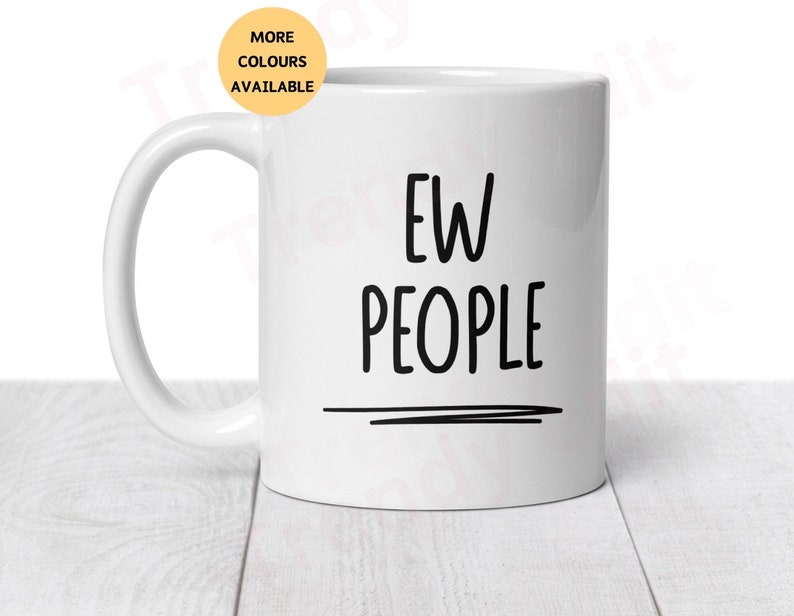 May include: White ceramic coffee mug with black text that reads "EW PEOPLE" with a black line underneath.