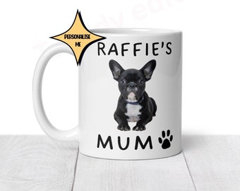 May include: White ceramic mug with a black French bulldog image and the text "Raffie's Mum" and a black paw print.