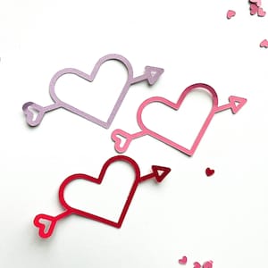 Découpes coeur avec flèche : papiers découpés, scrapbooking, fabrication de cartes