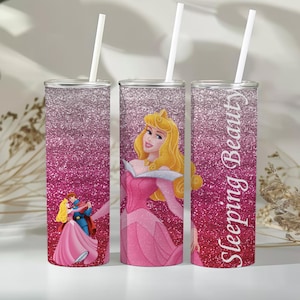 Peut inclure: Trois gobelets en paillettes roses avec un design dégradé rose et blanc. Le gobelet du milieu représente une princesse en robe rose. Le gobelet de droite porte l'inscription "Sleeping Beauty".