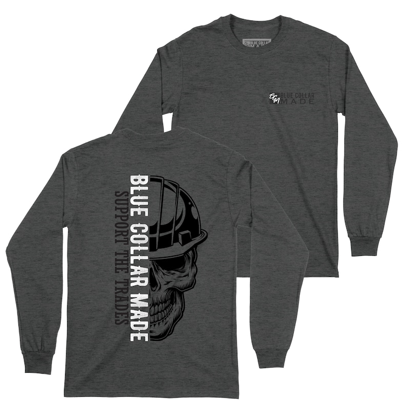 May include: Dark gray long-sleeve shirt with a skull wearing a hard hat graphic. The text "BLUE COLLAR MADE SUPPORT THE TRADES" is printed vertically on the back. The front has the text "BLUE COLLAR MADE".