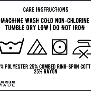 May include: White rectangular graphic with black text and care symbols. Text reads "CARE INSTRUCTIONS", "MACHINE WASH COLD NON-CHLORINE", "TUMBLE DRY LOW | DO NOT IRON". Includes fabric content: 50% polyester, 25% cotton, 25% rayon. "BLUE COLLAR MADE" logo.