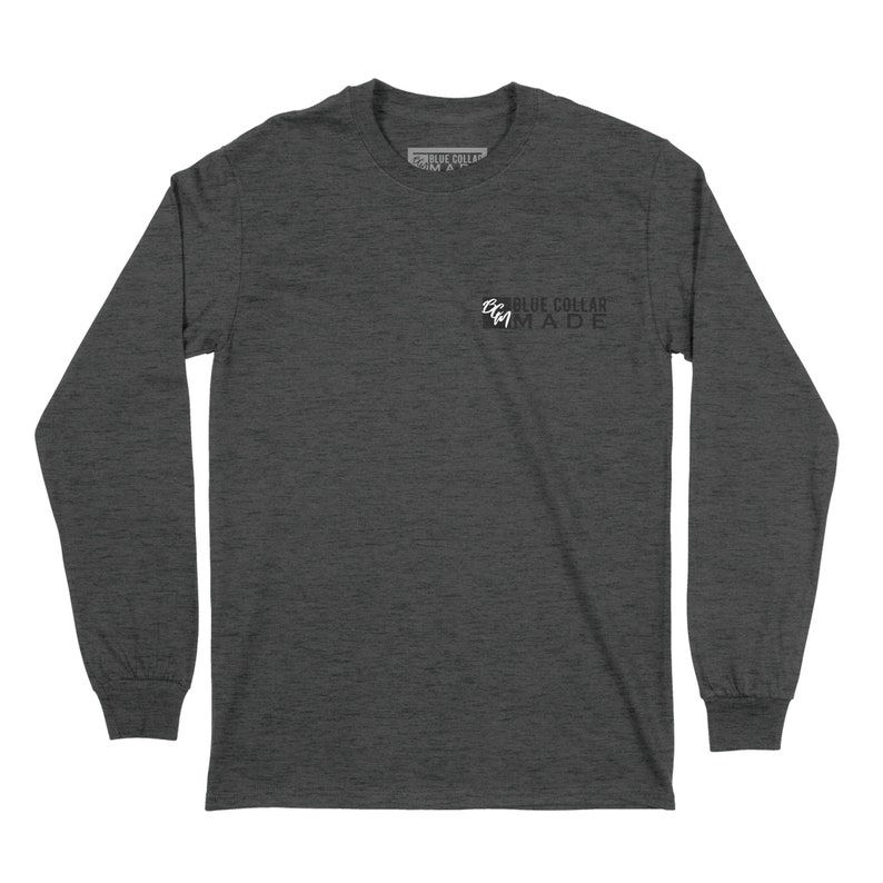 May include: Dark gray long-sleeve shirt with the text "BLUE COLLAR MADE" printed on the front. The shirt has a crew neck and ribbed cuffs. The text is in white and black. The shirt is made of a soft, comfortable material.