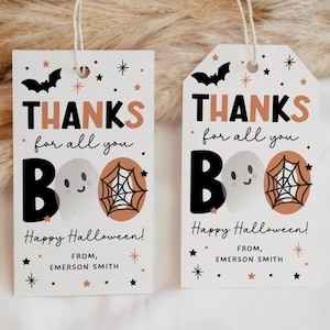 May include: Two rectangular white gift tags with string loops featuring the text THANKS for all you BOO and Happy Halloween! FROM, EMERSON SMITH. The design includes black bats, a ghost, a spider web, and small orange and black stars and dots.