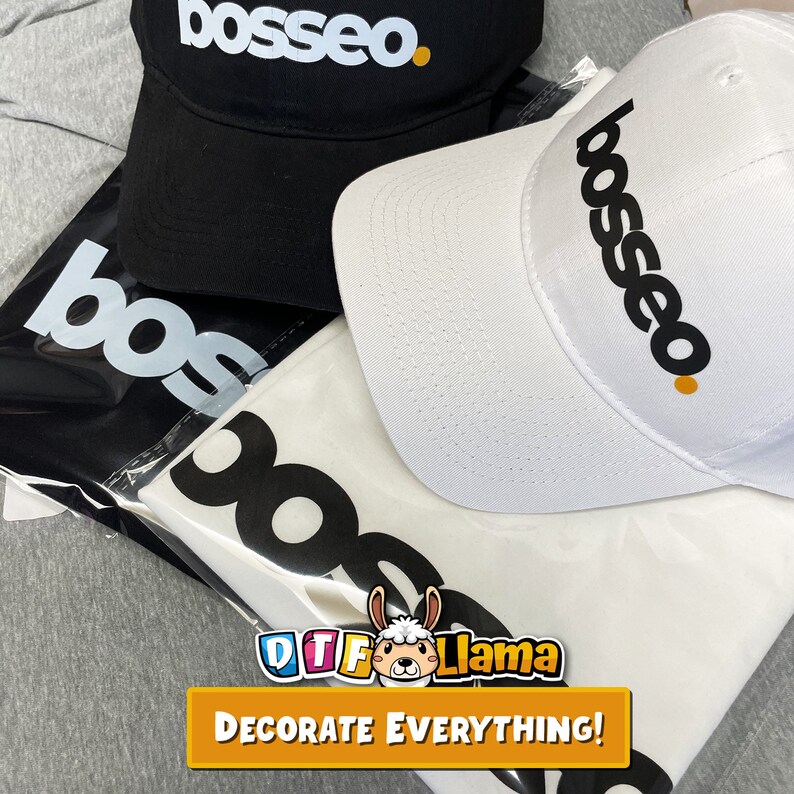 May include: A black baseball cap and a white baseball cap, both with the word "bosseo" printed in black and a small orange dot. A white t-shirt and a black bag with the word "bos" printed in white are also visible. The image includes the text "DECORATE EVERYTHING!"