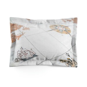 May include: White pillowcase featuring a vintage map design with brown landmasses, a compass rose, and a sailing ship. The pillowcase has a rectangular shape and a decorative border.