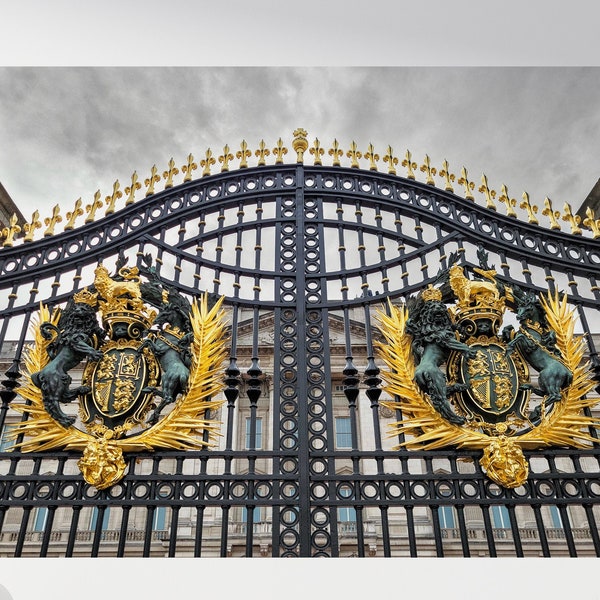 Black and Gold Royal Emblems at the Iron Gate of Buckingham Palace