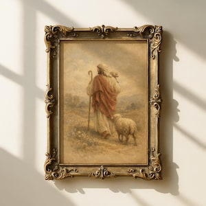 Op de afbeelding: Een ingelijste prent in antieke stijl toont een religieuze scène. Het kunstwerk toont een figuur in een rode mantel en witte kleding, die een staf vasthoudt en met een schaap loopt. De sierlijke gouden lijst voegt een klassieke touch toe aan het kunstwerk.