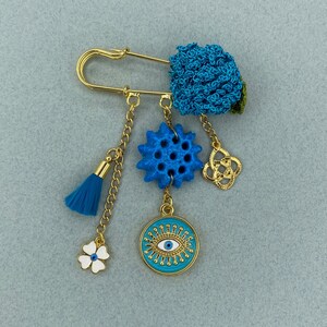 Blue Assyrian star beads evil eye brooch