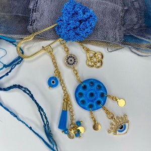 Blue Assyrian beaded brooch with protective eye