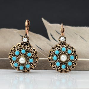 Ottoman rose shaped turquoise diamond simulant with bronze earrings antique design