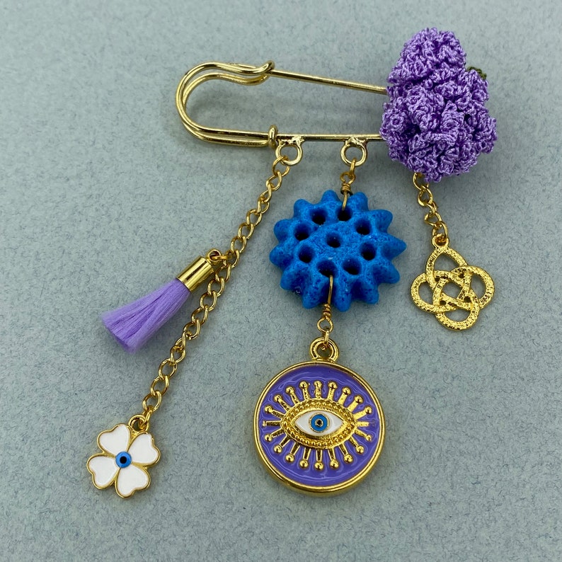 Purple Assyrian star beads evil eye brooch image 1