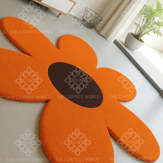 グルーヴィーなスタイルのレトロな花型ラグ - オレンジとブラウンの
