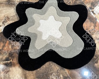 Alfombra de lana tejida a mano, alfombra moderna abstracta de forma irregular, alfombra contemporánea en negro y gris.