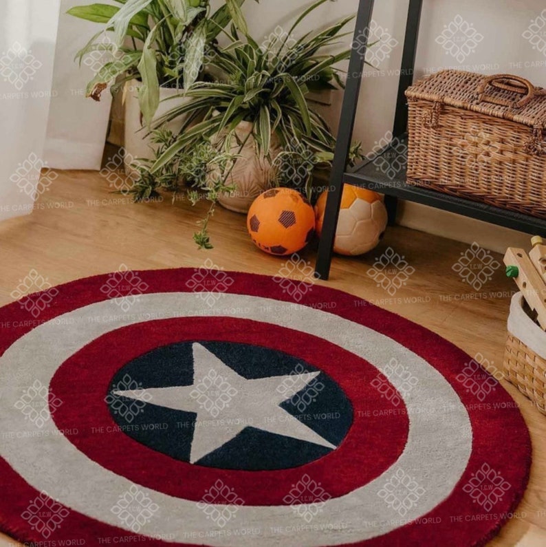 May include: A round, red, white, and blue rug with a large white star in the center. The rug is designed to look like Captain America's shield.