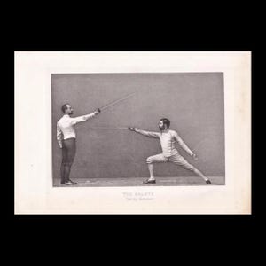 May include: A black and white vintage photograph showing two fencers in traditional gear. One stands upright while the other is in a lunge position, both holding foils. The text below reads THE SALUTE Taking distance, capturing a classic fencing stance.