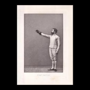 May include: A black and white vintage photograph depicting a fencer in a light-colored jacket and breeches, wearing a dark glove and holding a foil extended forward. The text FIRST POSITION is printed at the bottom of the framed image.