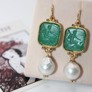 Intaglio glass printing earrings with a greek mythology figure and freshwater pearl made of gold plated silver 925o. Gift for her.