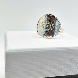 Silver Evil Eye ring. Engraved sterling silver Evil Eye ring with a green zircon. Protection Evil eye silver ring.