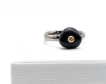 Black Pebble diamond ring made of 14K yellow gold and silver. Hand-made sea Pebble ring with natural diamond.