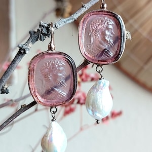 Intaglio glass printing earrings with a Roman figure made of rose gold plated silver 925o and ear wire closure.