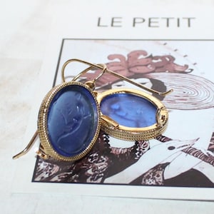 Intaglio printing wire earrings with Greek mythology figure, blue Venetian glass placed on gold plated silver 925o. Gift for her.