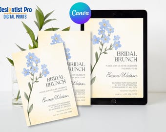 May include: Bridal brunch invitations with blue floral designs, presented with a tablet and foliage. The invitations display the text "Bridal Brunch" and event details, including the bride's name, date, time, and location.