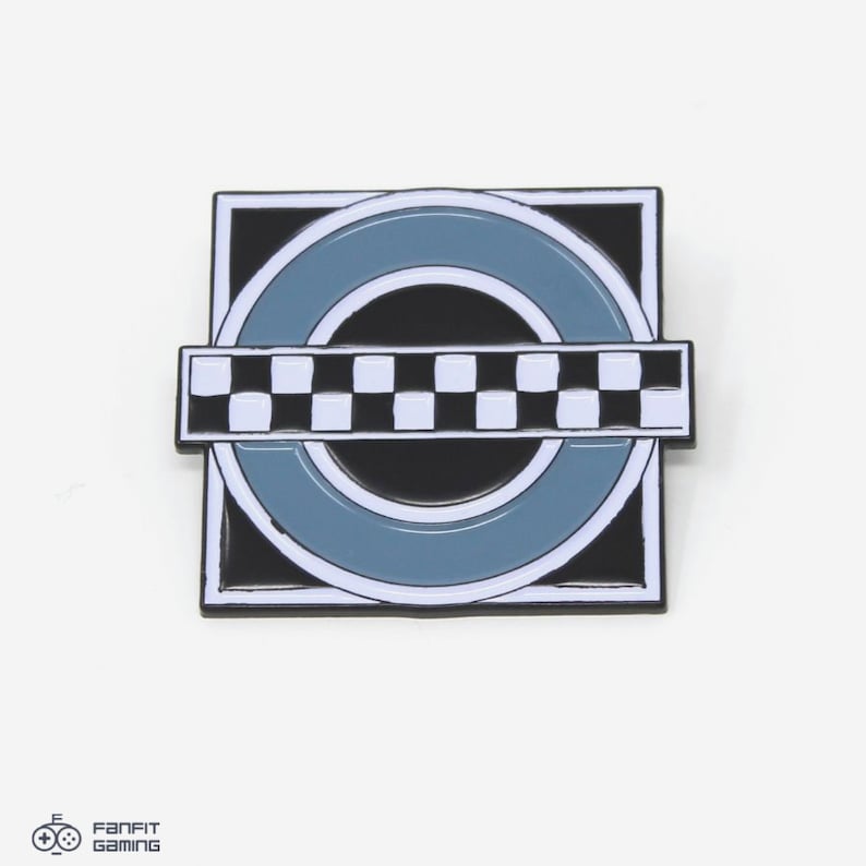 May include: A black and white checkered stripe design with a blue and white circle on a black square background. The design is a pin.