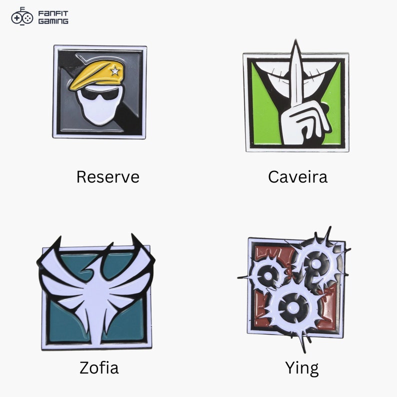 May include: Four enamel pins featuring characters from the video game Rainbow Six Siege. The pins are square and have a black outline. The top left pin features a white character with a yellow beret and sunglasses. The top right pin features a green background with a white hand making a shushing gesture. The bottom left pin features a white bird with a teal background. The bottom right pin features a red background with white gears and a black outline.