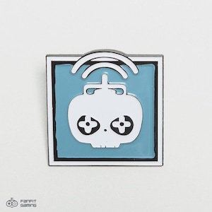 May include: A blue and white enamel pin featuring a skull with a wifi signal above it. The skull has two black eyes with white circles in the center. The pin is in the shape of a square with rounded corners.
